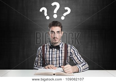 genius confused with many questions over his head