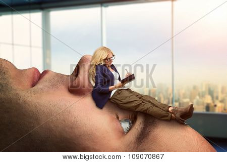 Businesswoman analyst is lying on the client's face