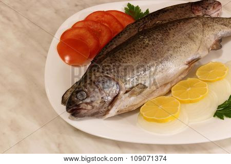 Two raw trouts