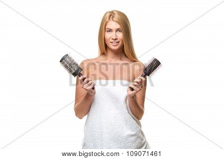 Young attractive  woman  hair and blue eyes in towel