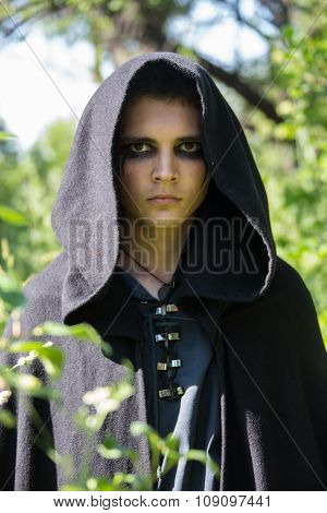 serious guy in a black robe