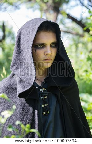 serious guy in a black robe