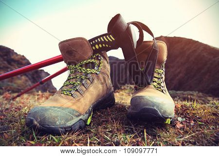 hiking boots on mountain peak