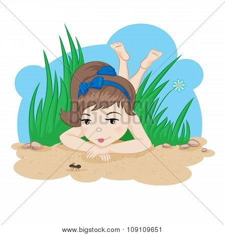 Girl in grass watching at ant