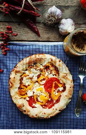 Vegetable ragout , vegetable casserole with tomato, food close up. Vegetable ragout on wood table, c