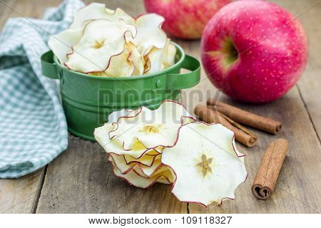 Healthy Snack. Homemade Apple Chips On Rustic Wooden Background