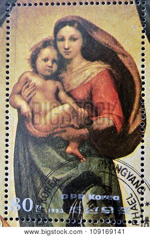 DPR KOREA - CIRCA 1983: A stamp printed in North Korea shows Sistine Madonna Painting by Raphael