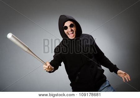 Aggressive man with basebal bat 