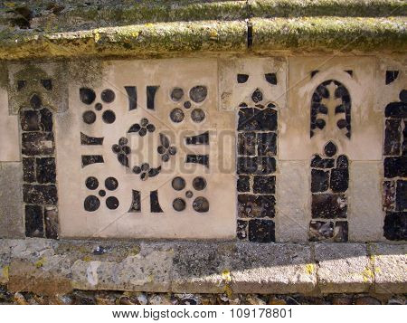 Ornamental flint in church wall