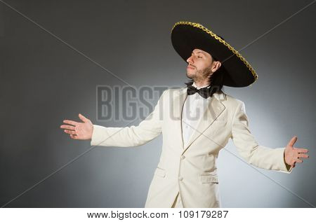 Person wearing sombrero hat in funny concept