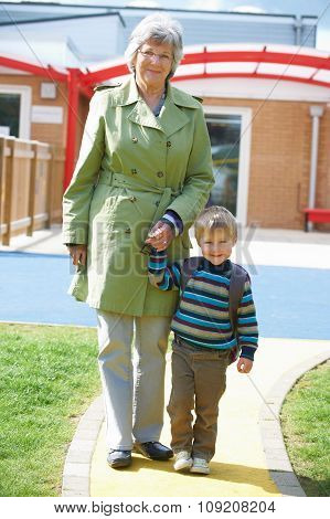 Grandmother Taking Grandson To School