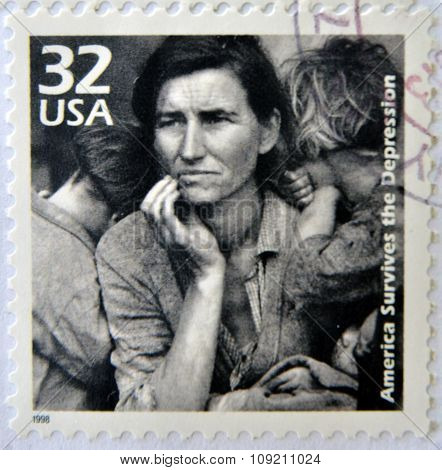 stamp printed in USA showing an image of a mother with her children during the Great Depression