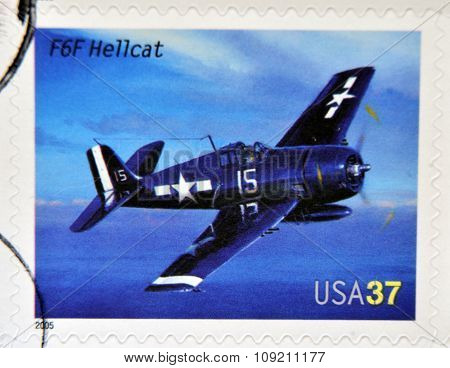 A stamp printed in USA dedicated to advances in aviation shows Grumman F6F Hellcat