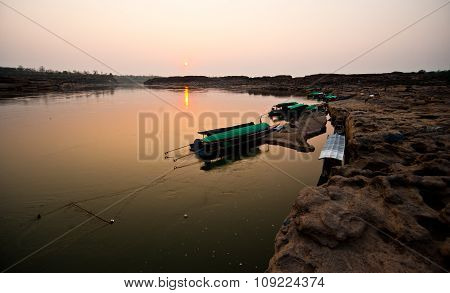 Longtail Boat, Berth At Sand Sam Pan Bok Grand Canyon In Maekhong River, Northeast Of Thailand