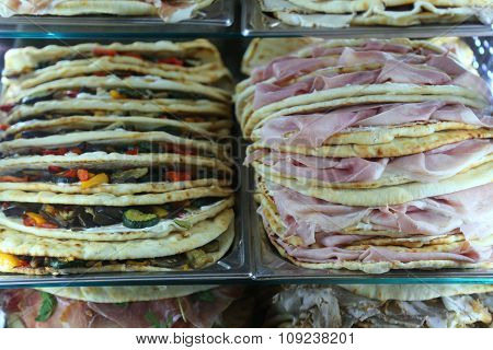 Appetizing Piadina Stuffed For Sale In The Restaurant In Central Italy