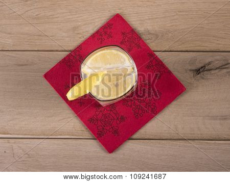 Image Of Glass Of Lemonade On Wood Background With Nepkin.