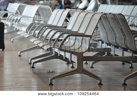 Row Of Empty Benches At An Airport