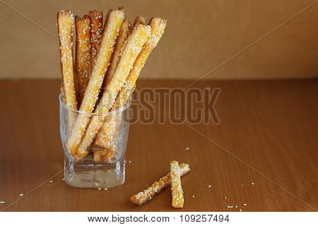 Bread Sticks With Cheese And Sesame In The Glass