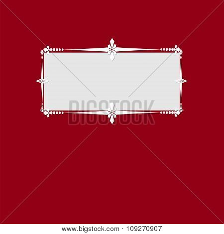 hite frame with an ornament on a red background