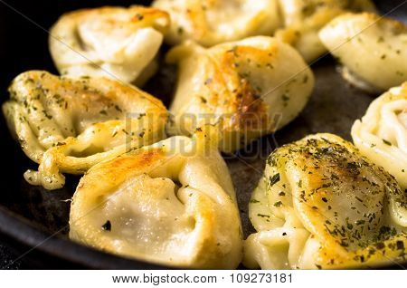 Fried Dumplings With Beef On Rustic Pan