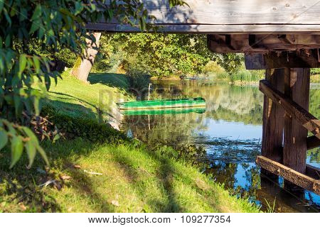 Boat under the bridge.