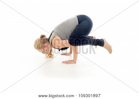 Pregnant woman doing sport exercises in yoga style