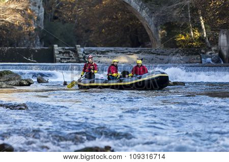 Adventurous Group Doing White Water Rafting The Rapids Of River Voidomatis In Konitsa