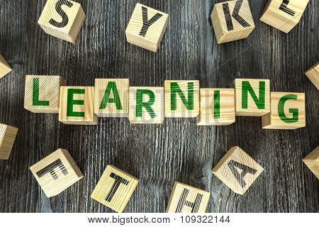 Wooden Blocks with the text: Learning