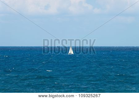 Peaceful Ocean Landscape With A White Yacht Afar Off.