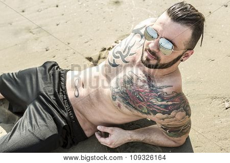 sexy man with tattoo