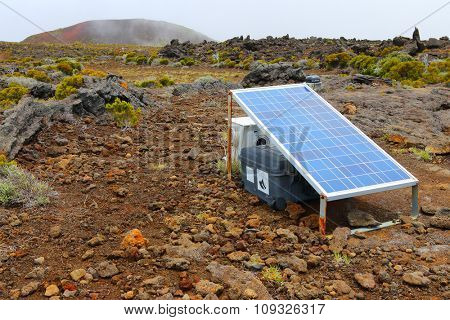 PITON DE LA FOURNAISE, REUNION ISLAND, FRANCE - NOVEMBER 6, 2015: Measuring instrument for earthquake forecast. Scientific equipment on a currently one of the most active volcanoes in the world.
