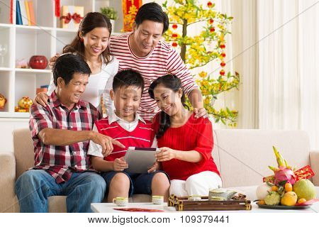 Family With Tablet Computer