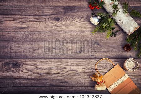 Christmas background on wooden table and copy space, shopping bag