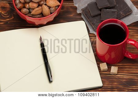 Blank Open Notepad. Cup Of Coffee. Wooden Background