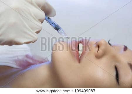 Woman Gets An Injection In Her Lips In Beauty Salon