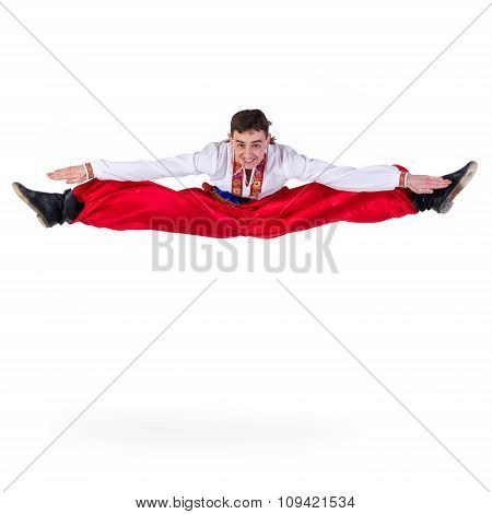 Russian cossack dance. Young dancer jumping