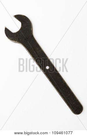 old wrench isolated on white