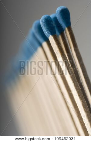 row of blue matches