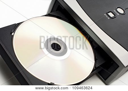 open cd/dvd burner with a disk in it