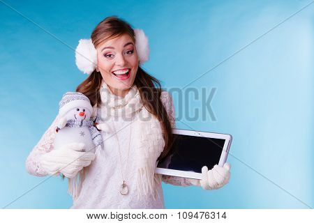 Woman Girl With Tablet And Little Snowman. Winter.