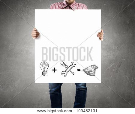 Businessman holding banner with drawn money earning concept