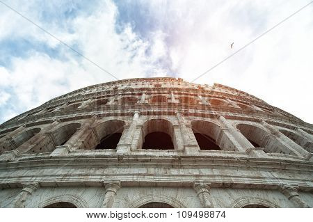 View Of The  Anphitheatre Colosseum With The Sun In The City Of Rome