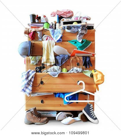 Mess, dresser with scattered clothes