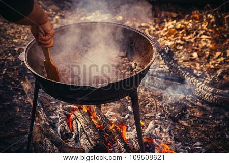 Cast Iron Pot Outdoors, Cooking On A Fire.