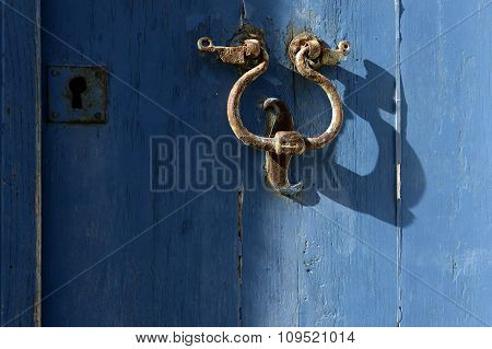 The Old Door Knocker On The Blue.