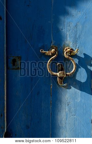 The Old Door Knocker On The Blue.