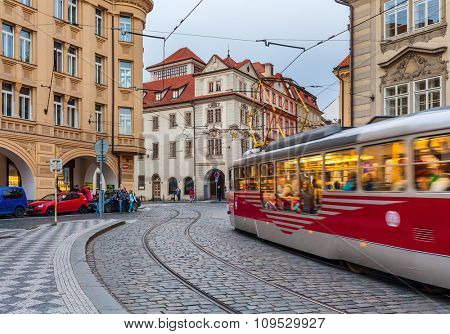 PRAGUE, CZECH REPUBLIC - SEPTEMBER 22, 2015: Tram passing in Old City of Prague. It is largest network consisting of 142 km of track, 931 trams and serves millions of passengers each year.