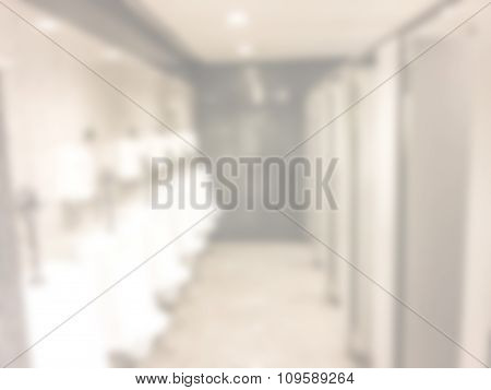 Blurred / Defocussed Abstract Background Of Men Restroom In An Office Building With Vintage Color Ef