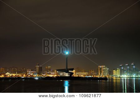 Across Baku Bay at night, showing light on rocks and view of the Formula 1 circuit location