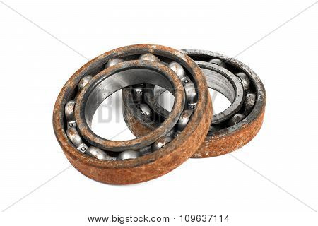 Old and rusty ball bearing, isolated on white background